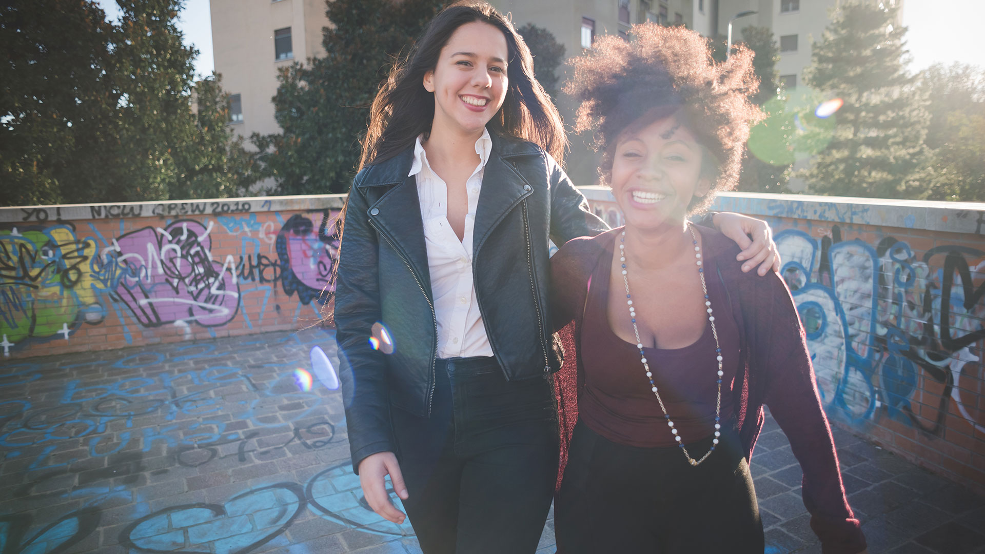 Two Multiethnic Young Women Smiling